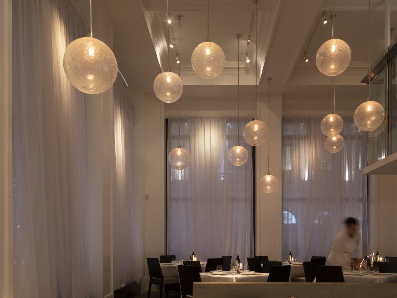 Retro spotlights chosen for sympathetic design to co-ordinate with Alain Carle interiors